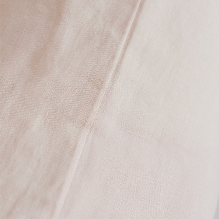 Foxtrot Home French Flax Linen styled in a bedroom with Blush Pink