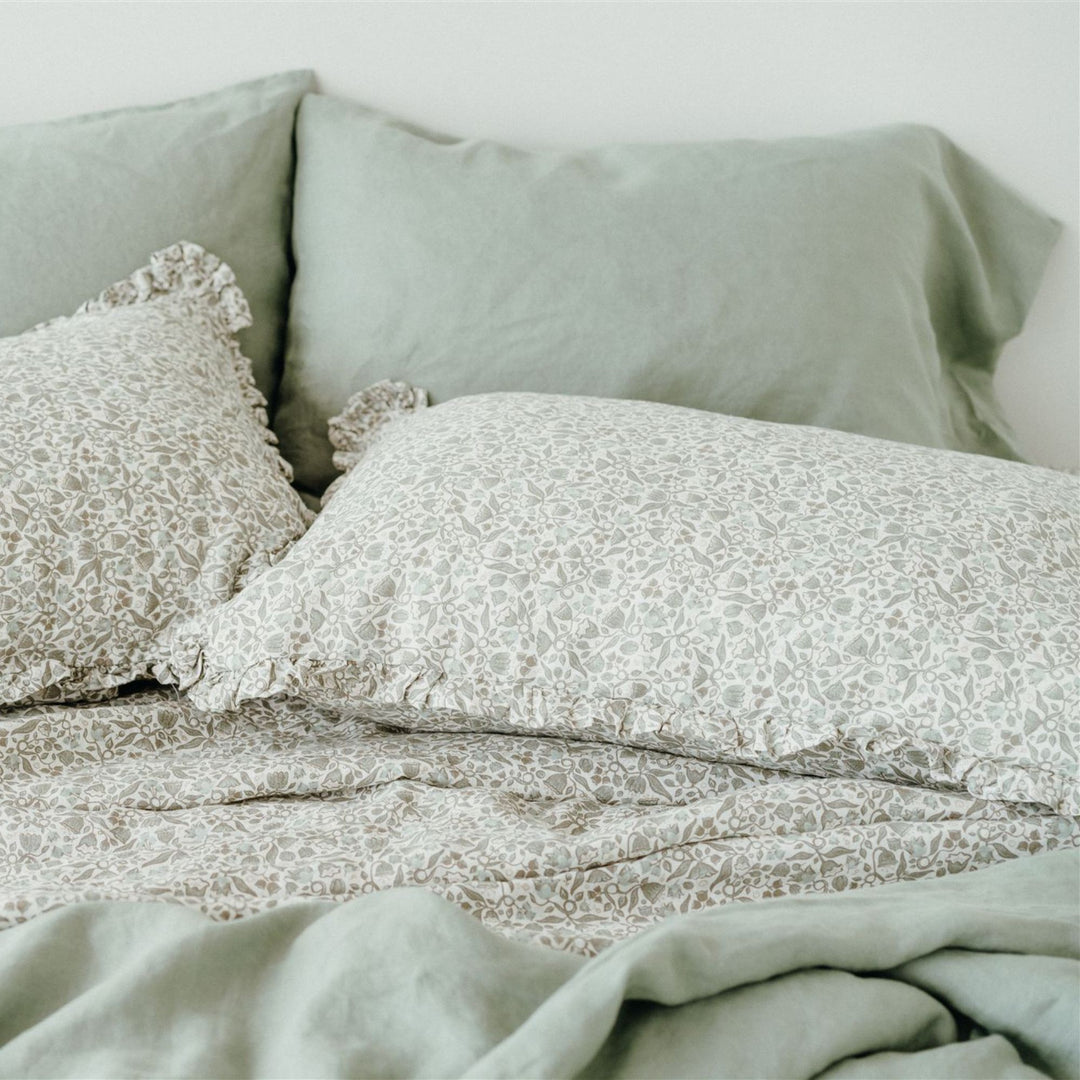 Pure French Flax Fitted Sheet in vintage floral print Evelyn.  A whimsical pattern for Spring.  Discover Foxtrot Home’s natural, ethically produced bedding for relaxed styling.