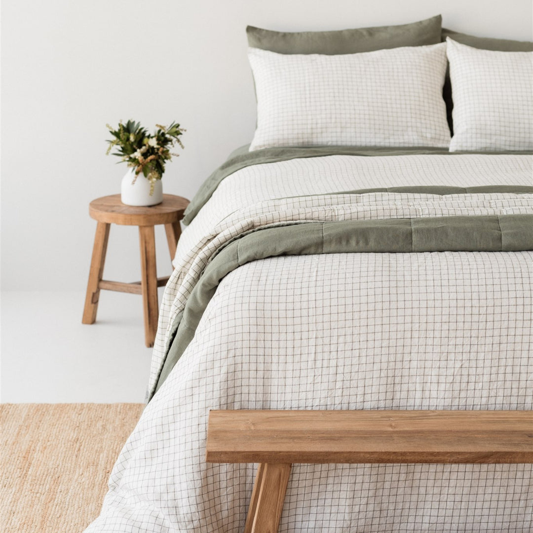 Foxtrot Home French Flax Linen styled in a bedroom with Cactus and Cactus Grid Quilt, Cactus Grid Duvet, Cactus Sheets Set and Pillowcases