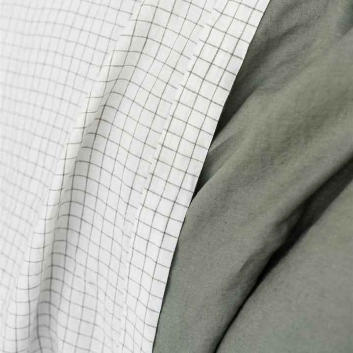Foxtrot Home French Flax Linen styled in a bedroom with Cactus and Cactus Grid Quilt, Cactus Grid Duvet, Cactus Sheets Set and Pillowcases