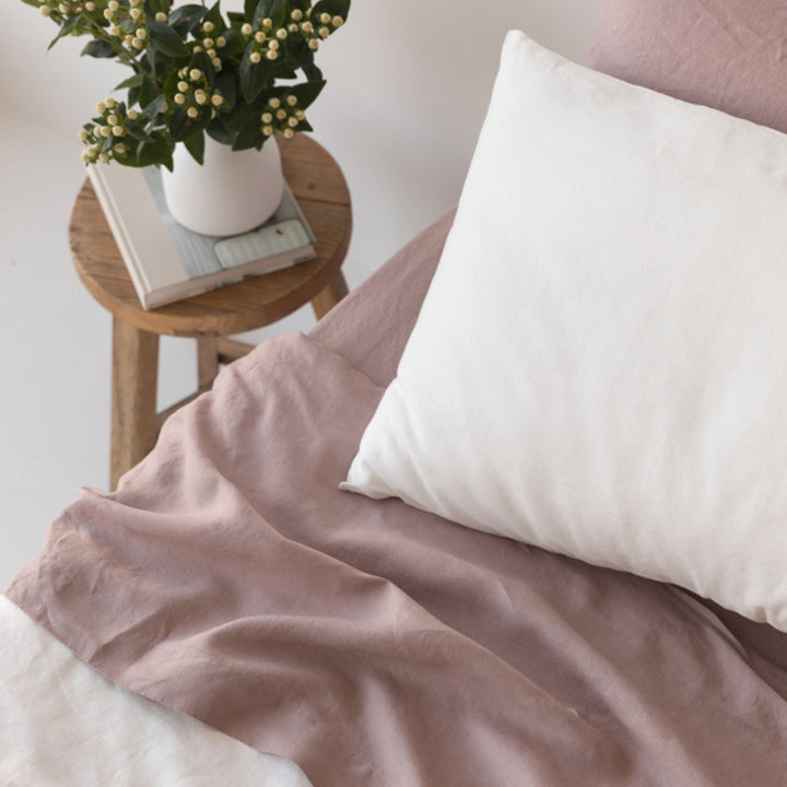 Foxtrot Home French Flax Linen styled in a bedroom with Off White Pillowcases.