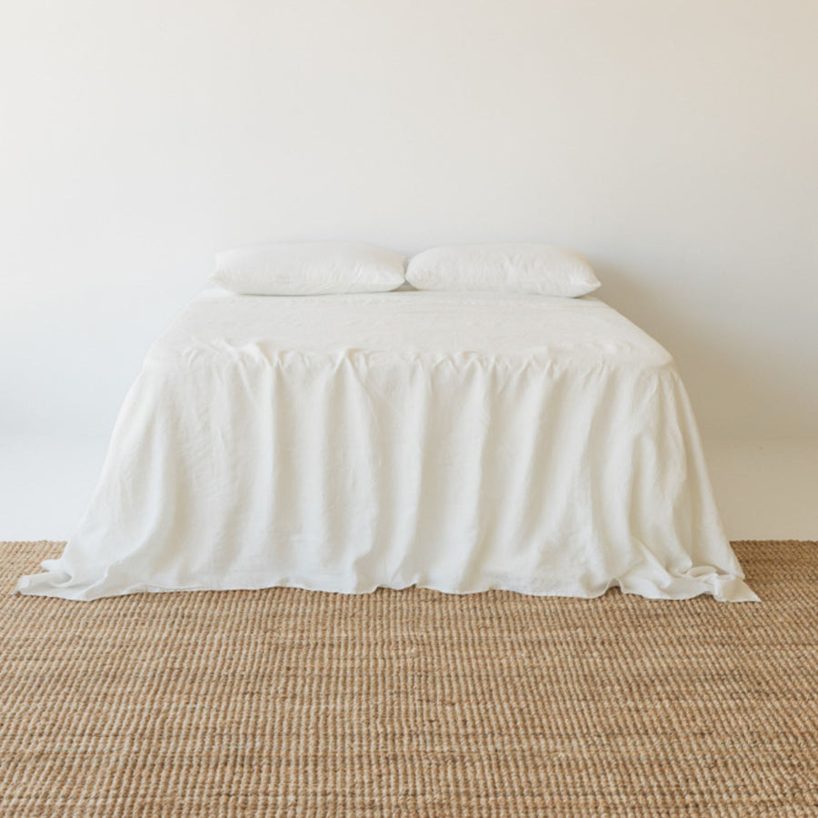 Foxtrot Home French Flax Linen styled in a bedroom with Off White Flat Sheet.