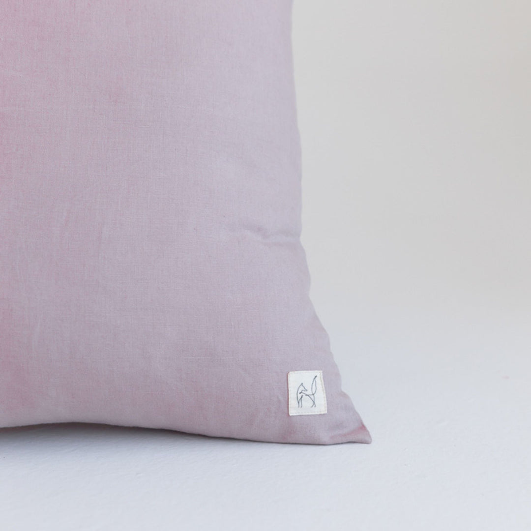 Foxtrot Home French Flax Linen styled in a bedroom with Rosewood Cushion Cover.