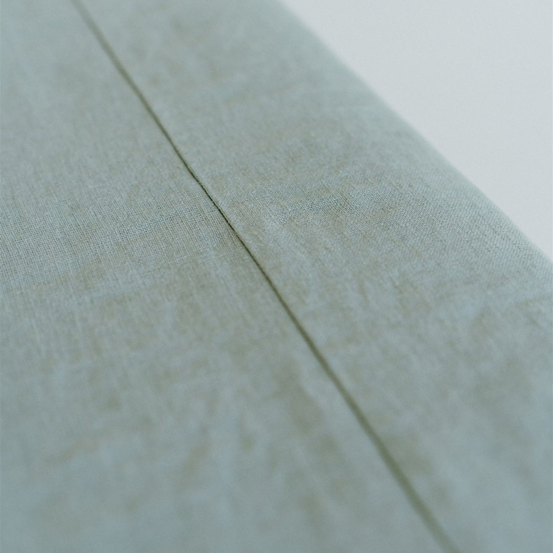 Foxtrot Home French Flax Linen styled in a bedroom with a Sage Green Bedspread