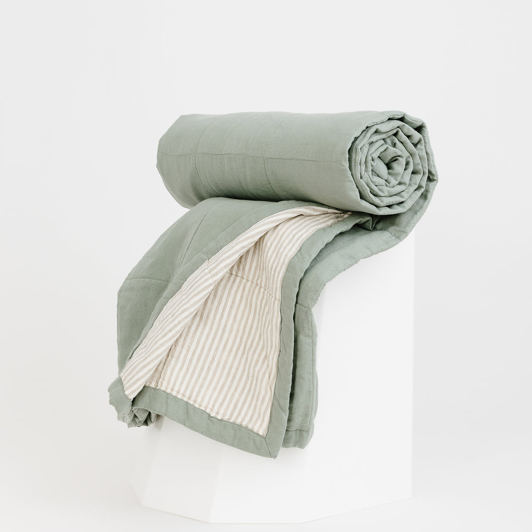 Foxtrot Home French Flax Linen Quilt in Sage with Sand Stripes on the reverse