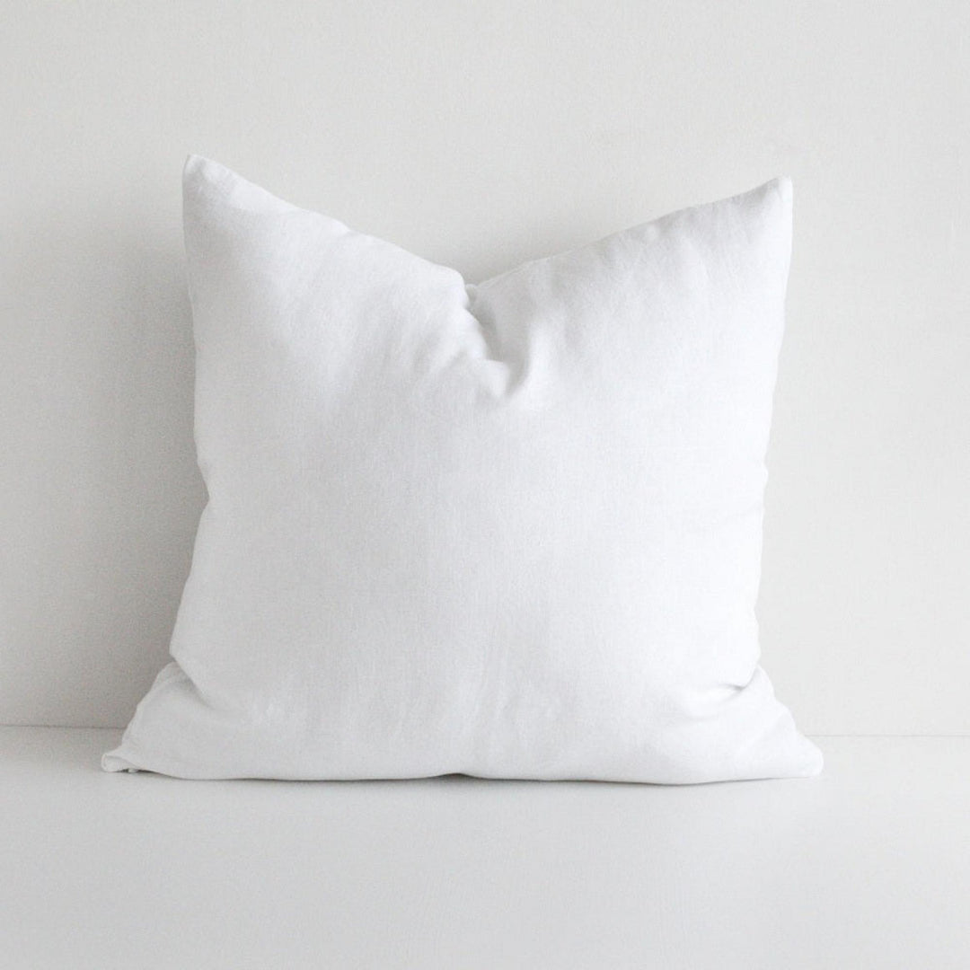 Foxtrot Home French Flax Linen styled in a bedroom with Brilliant White Cushion Cover.