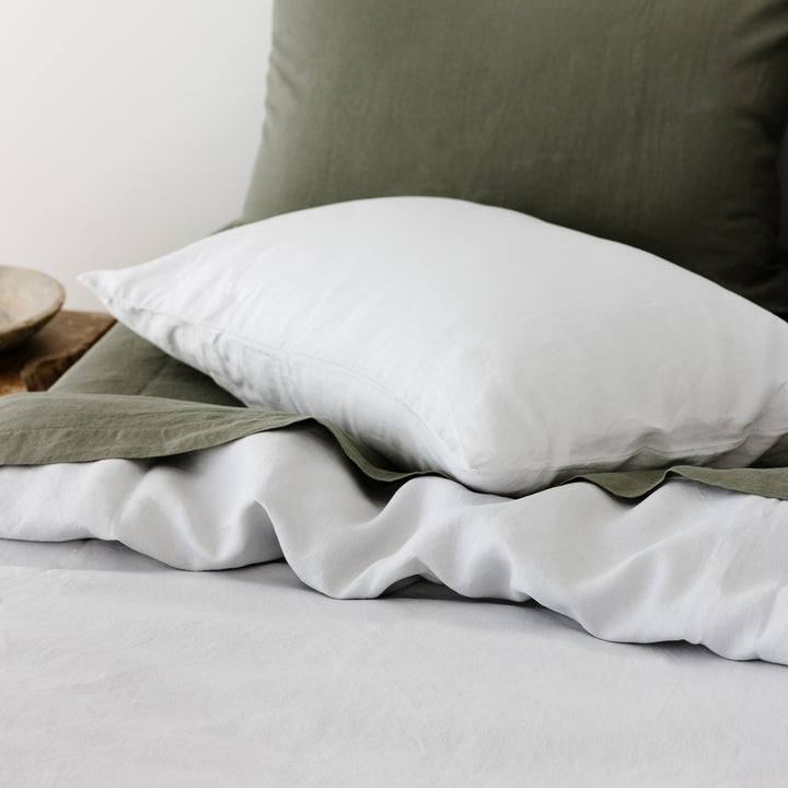 Foxtrot Home French Flax Linen styled in a bedroom with Cactus Green Sheets Set.