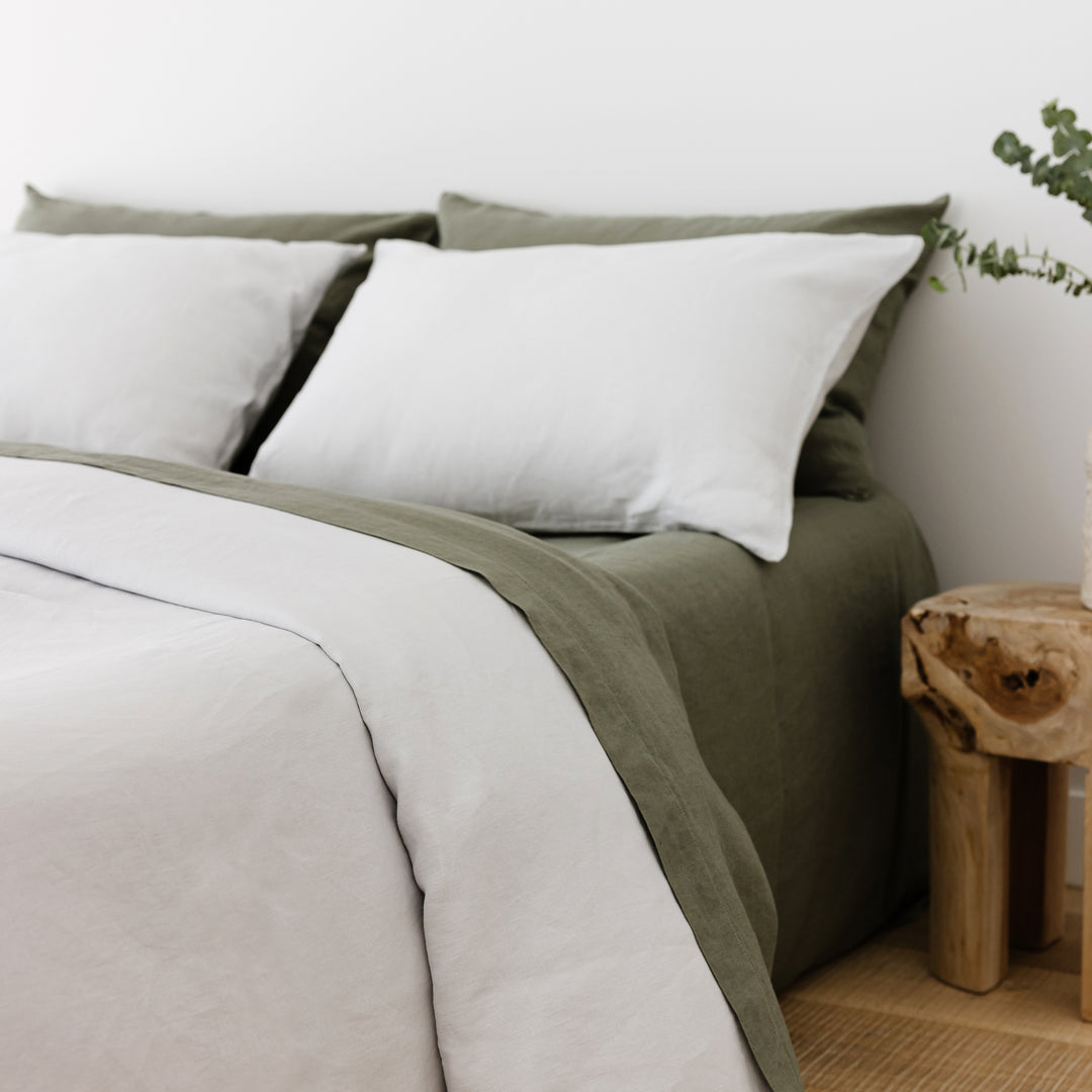 Foxtrot Home French Flax Linen styled in a bedroom with Cactus Green Sheets Set.