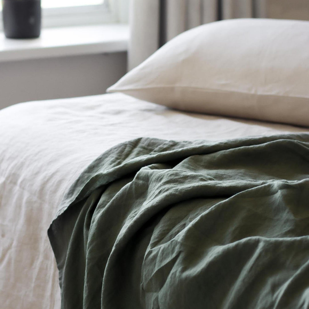 Foxtrot Home French Flax Linen styled in a bedroom with Cactus Green Sheets Set.
