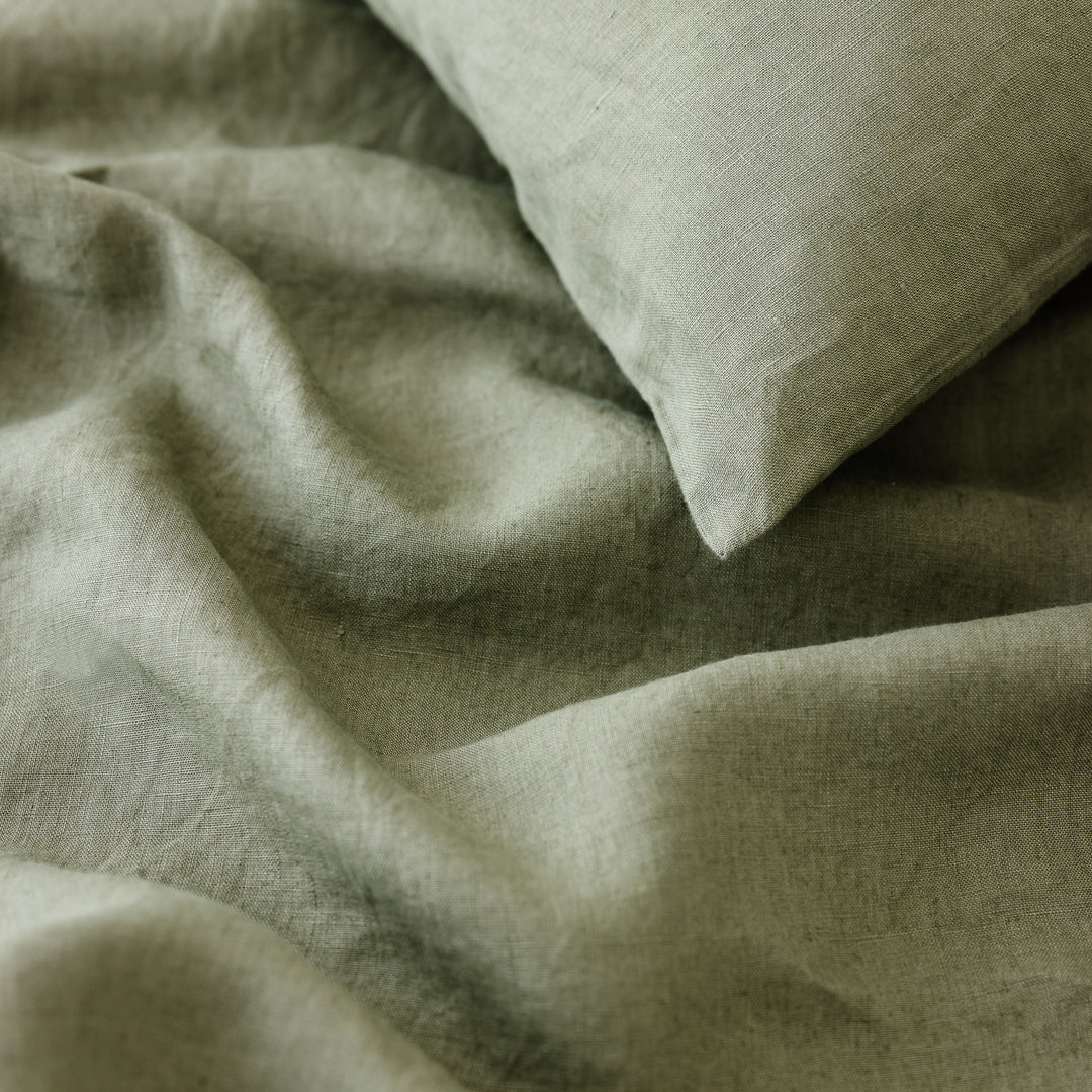 Foxtrot Home French Flax Linen styled in a bedroom with Cactus Green Sheets Set.