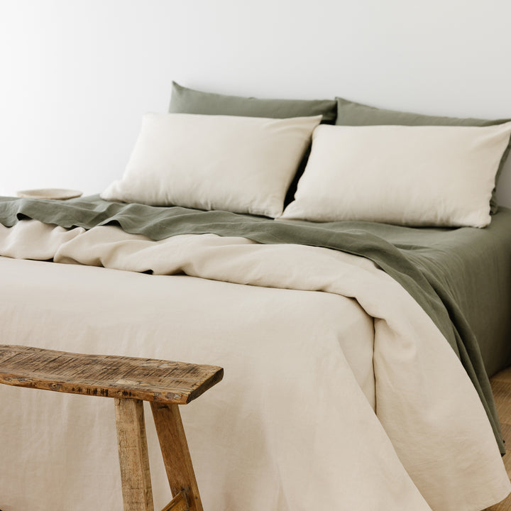 Foxtrot Home French Flax Linen styled in a bedroom with Cactus Green Sheets Set.