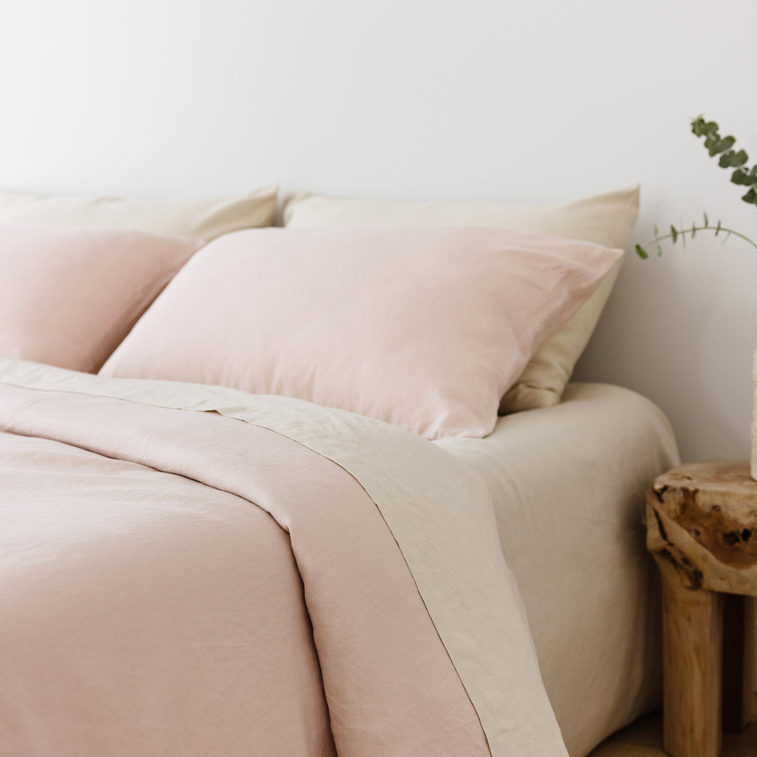 Foxtrot Home French Flax Linen styled in a bedroom with Blush Pink Duvet, Oat Sheets Set and Pillowcases