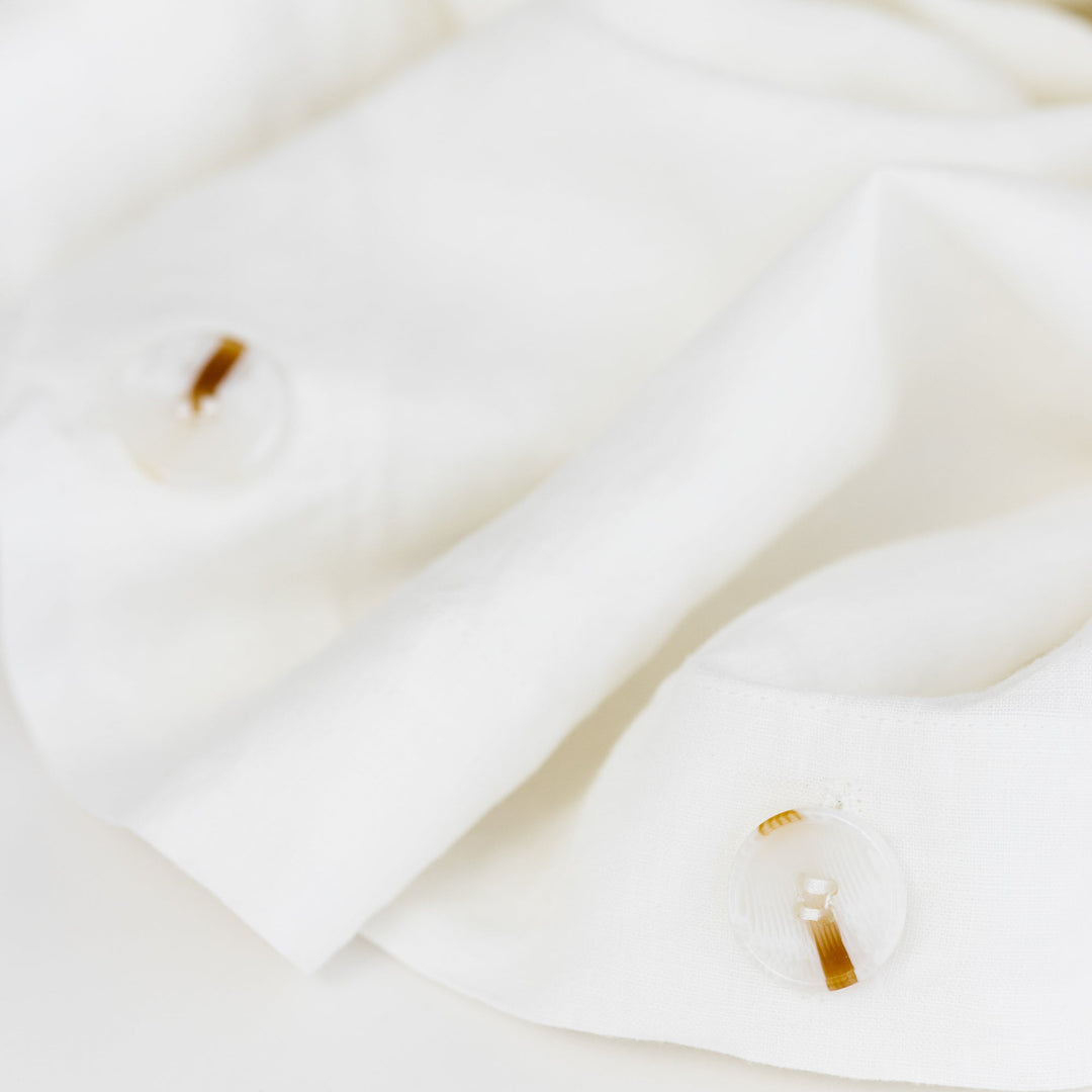 Foxtrot Home French Flax Linen styled in a bedroom with Brilliant White Duvet, Powder Blue Sheets Set and Pillowcases.