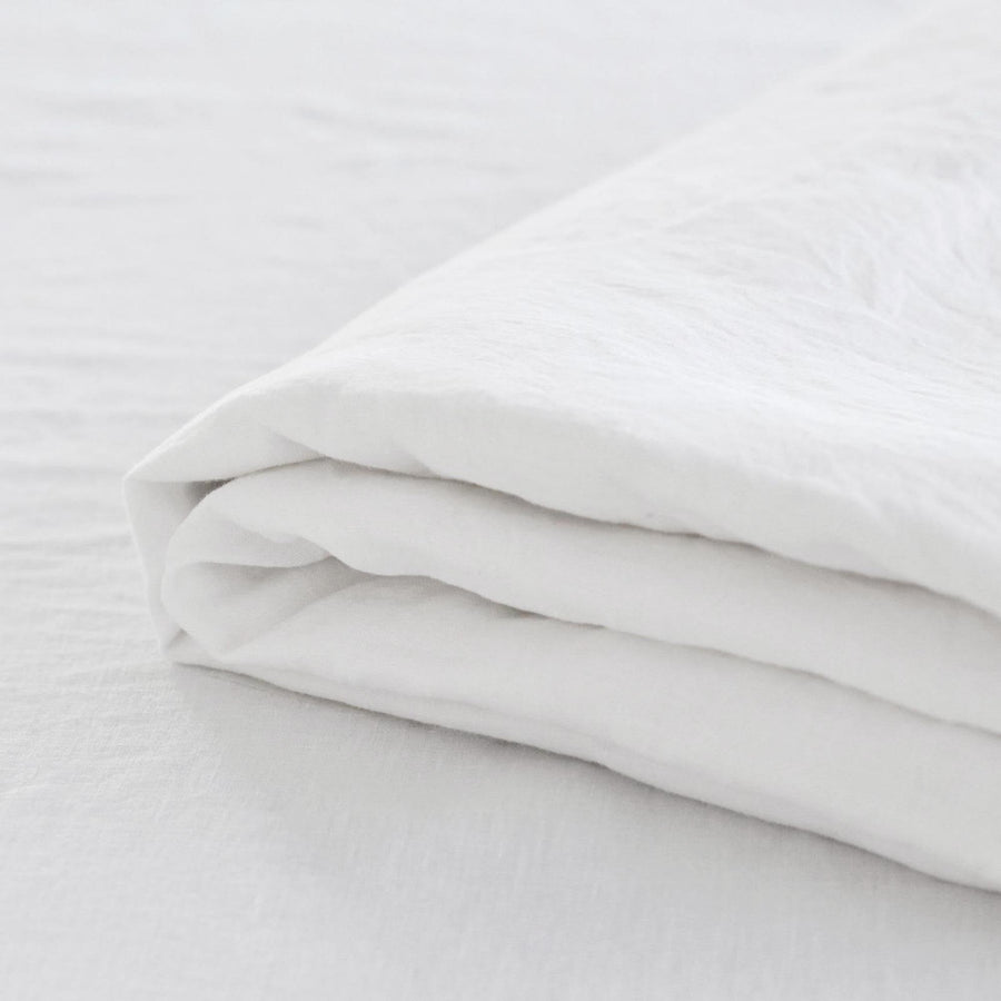 Foxtrot Home French Flax Linen styled in a bedroom with Brilliant White Flat Sheet.