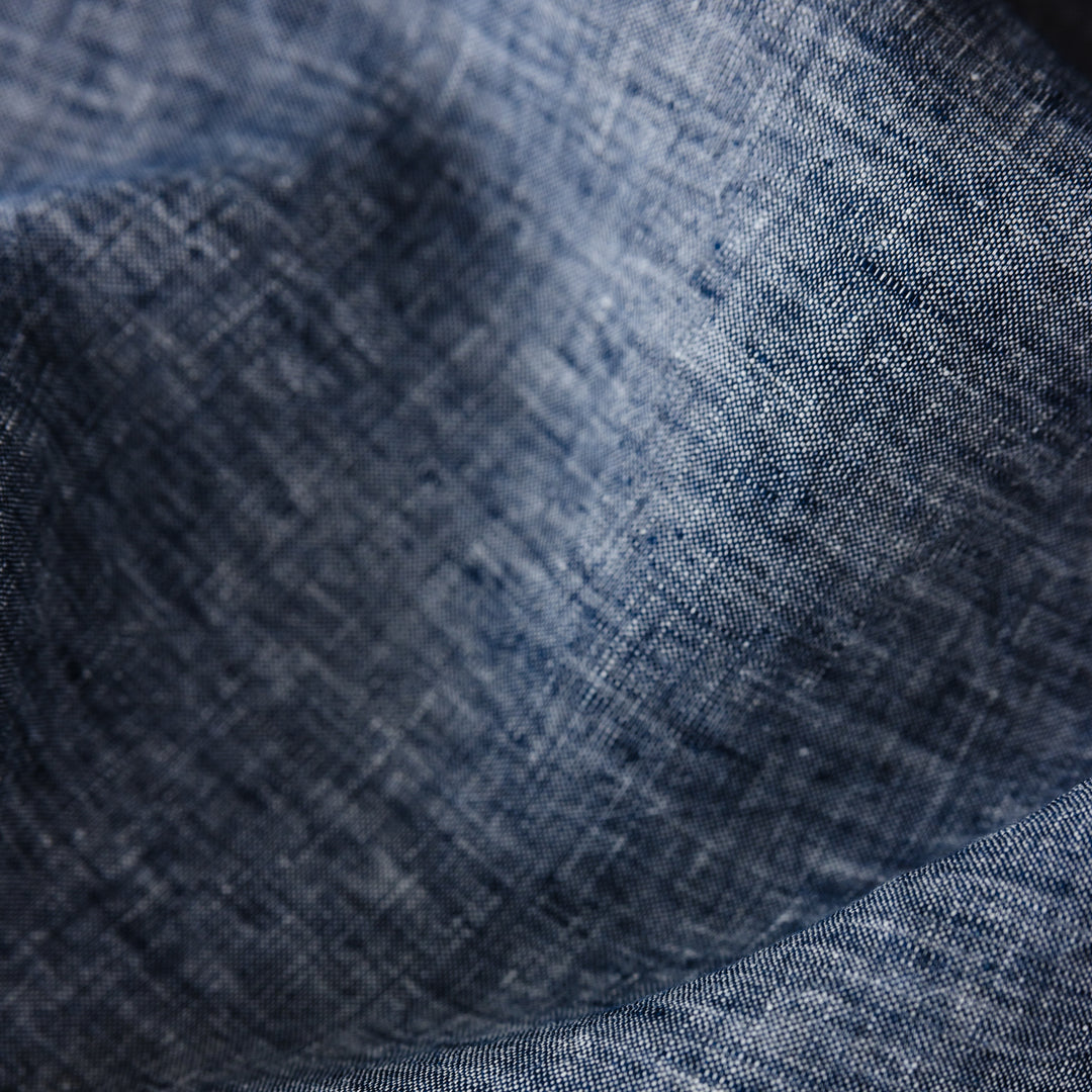 Foxtrot Home French Flax Linen styled in a bedroom with Denim Blue Duvet.