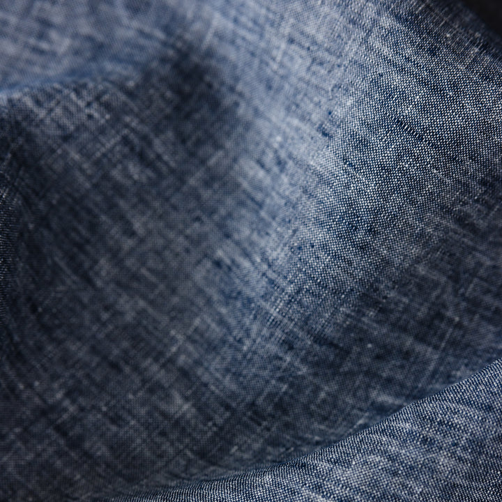 Foxtrot Home French Flax Linen styled in a bedroom with Denim Blue Duvet.