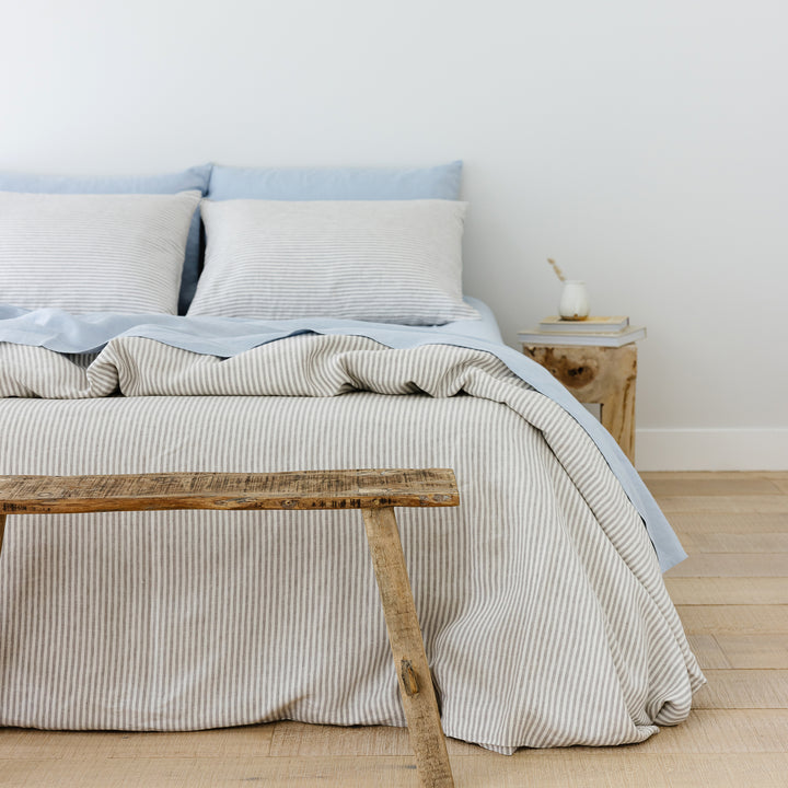 Foxtrot Home French Flax Linen styled in a bedroom with Grey Stripes Duvet.