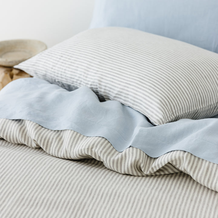 Foxtrot Home French Flax Linen styled in a bedroom with Grey Stripes Duvet.