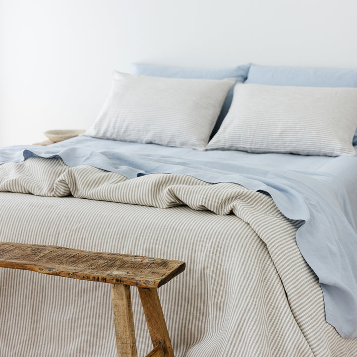 Foxtrot Home French Flax Linen styled in a bedroom with Grey Stripes Duvet.