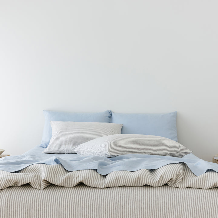 Foxtrot Home French Flax Linen styled in a bedroom with Grey Stripes Duvet.