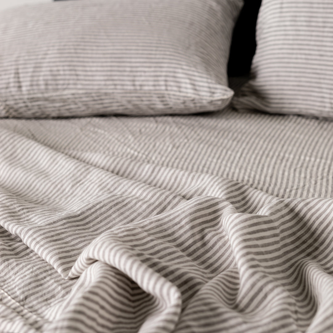 Foxtrot Home French Flax Linen styled in a bedroom with Grey Stripes Flat Sheet.
