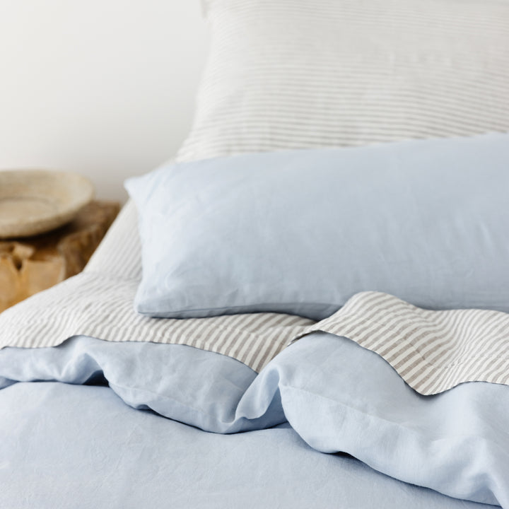 Foxtrot Home French Flax Linen styled in a bedroom with Grey Stripes Fitted Sheet.