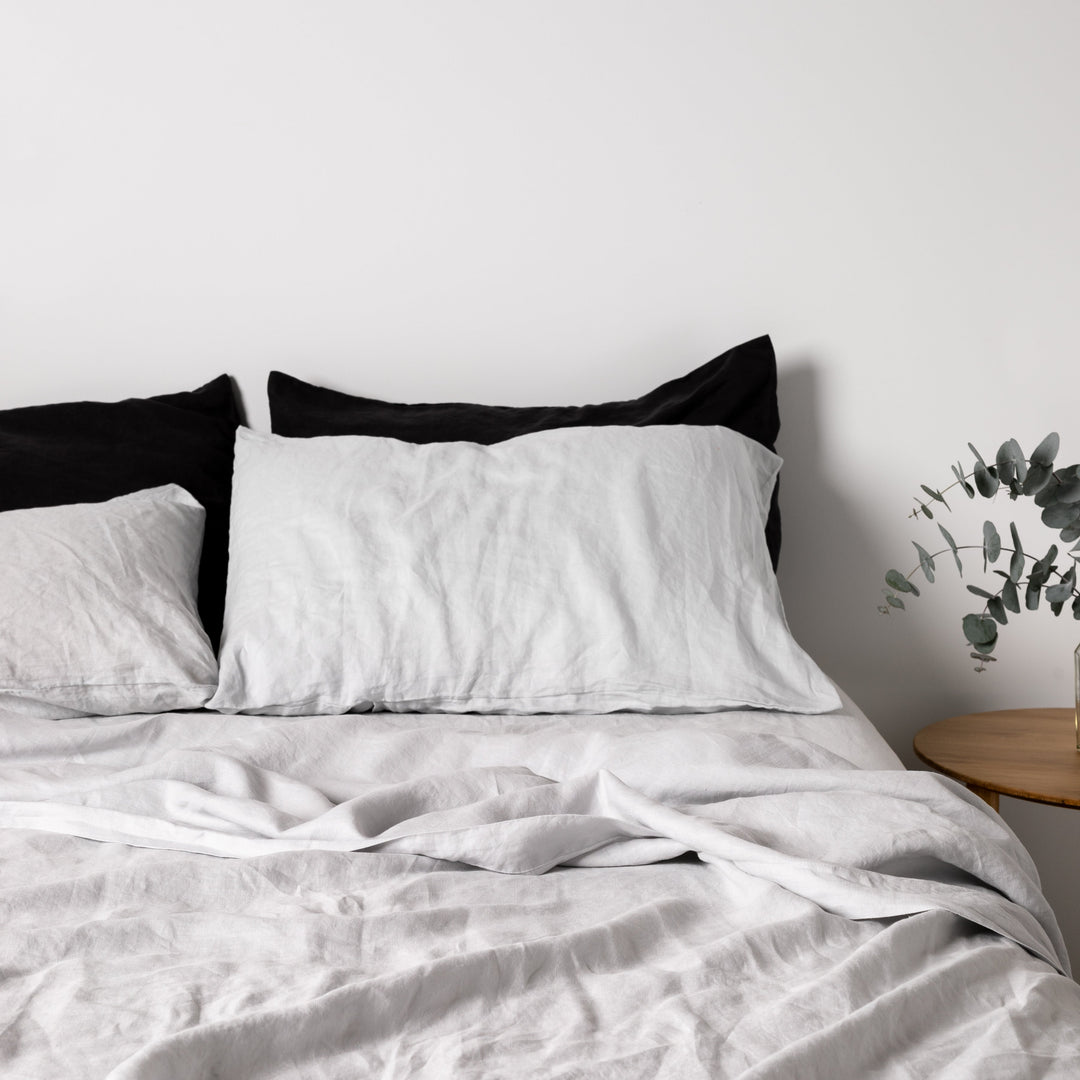 Foxtrot Home French Flax Linen styled in a bedroom with Light Grey Fitted Sheet.