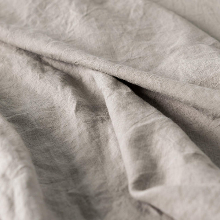 Foxtrot Home French Flax Linen styled in a baby's bedroom with a Natural Cot Duvet.