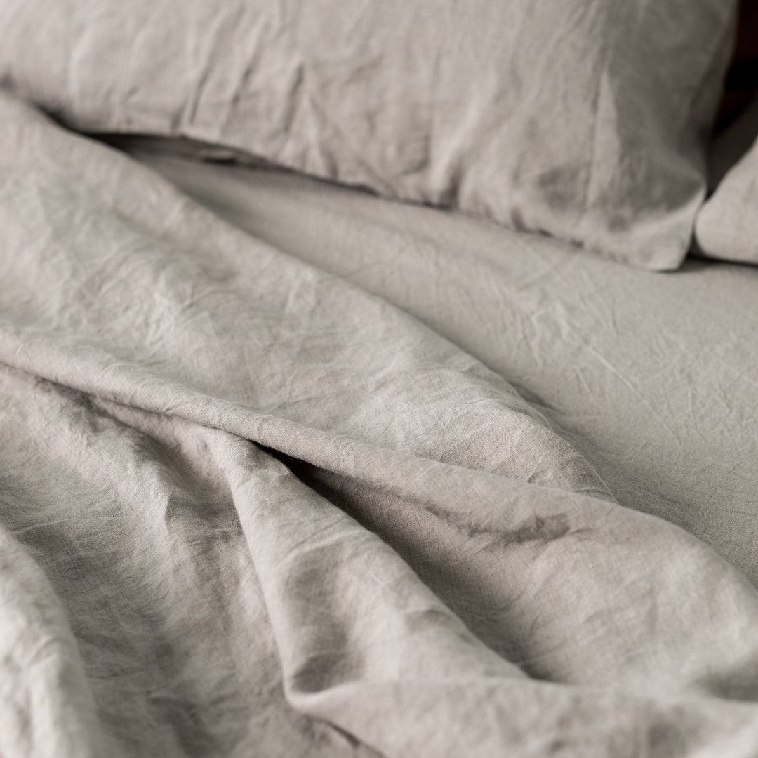 Foxtrot Home French Flax Linen styled in a bedroom with Natural Sheets Sets.