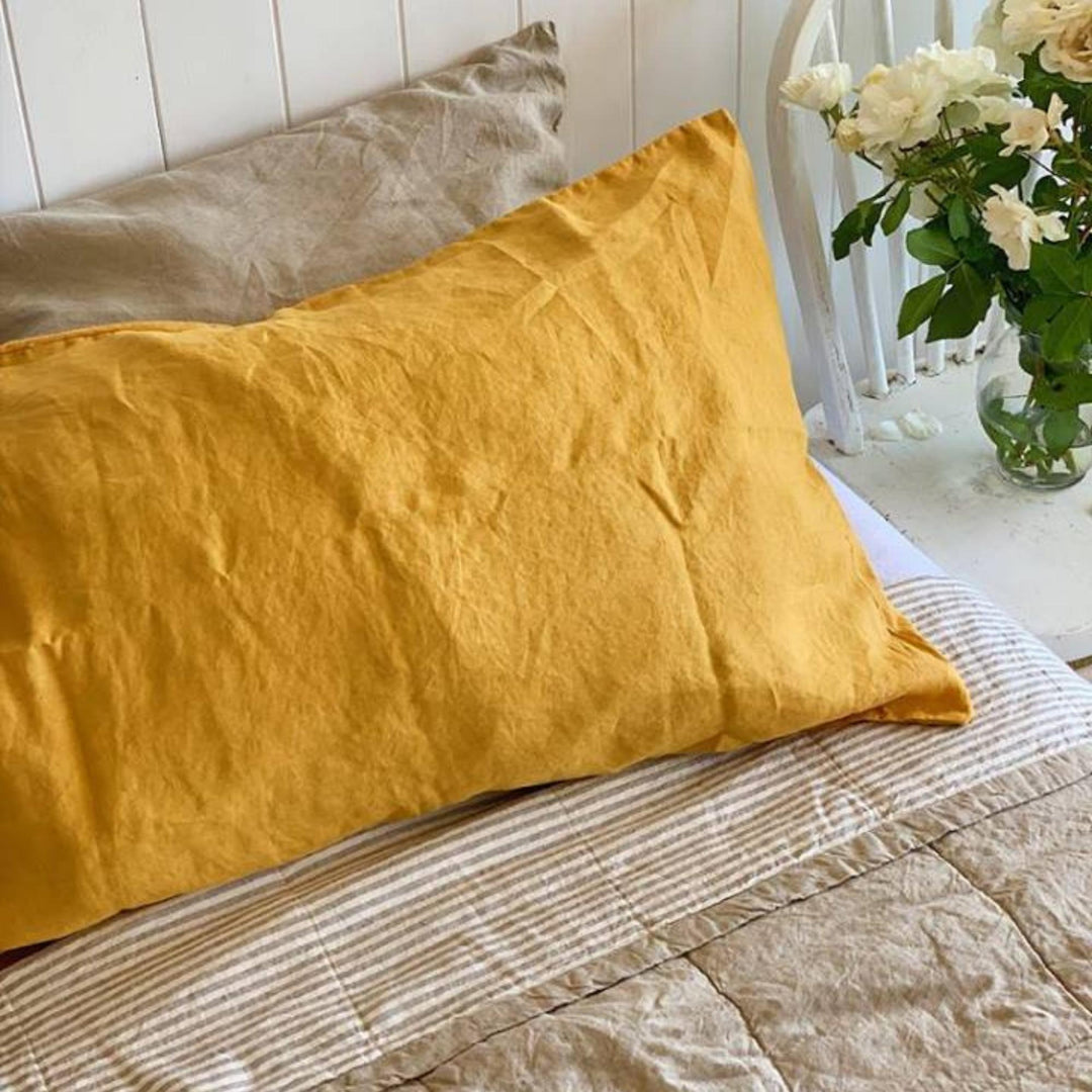 Foxtrot Home French Flax Linen styled in a bedroom with Natural & Grey Stripes Quilt.