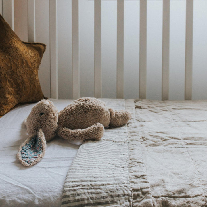 Foxtrot Home French Flax Linen styled in a bedroom with Natural & Grey Stripes Quilt.