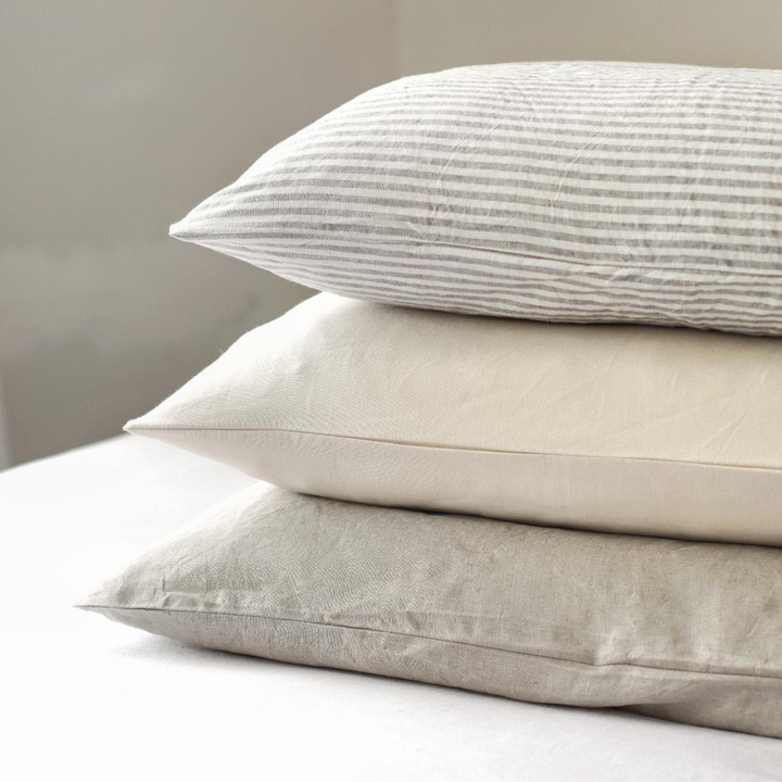 Foxtrot Home French Flax Linen Oat Sheet Sets styled in a bedroom.