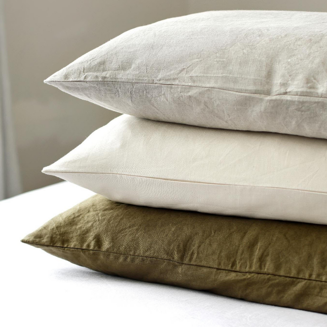 Foxtrot Home French Flax Linen Oat Sheet Sets styled in a bedroom.