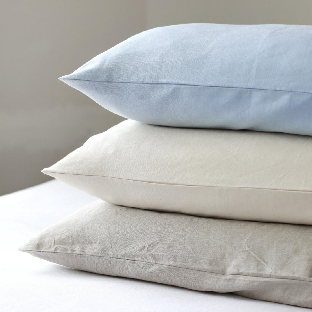 Foxtrot Home French Flax Linen Oat Sheet Sets styled in a bedroom.