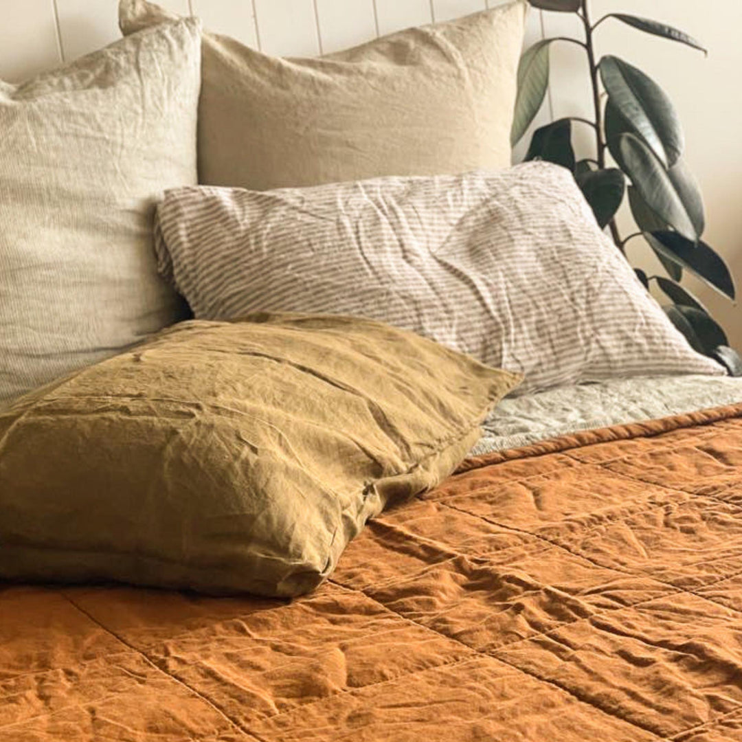 Foxtrot Home French Flax Linen styled in a bedroom with Tobacco and Pinstripes Quilt.