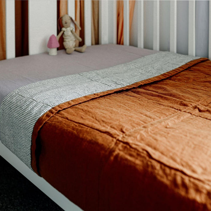 Foxtrot Home French Flax Linen styled in a bedroom with Tobacco and Pinstripes Quilt.