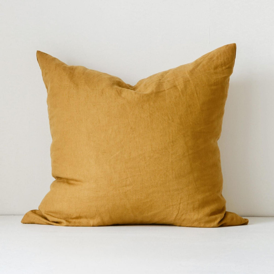 Foxtrot Home French Flax Linen styled in a bedroom with Ginger Honey Cushion Cover.