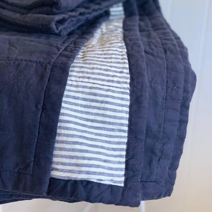 Foxtrot Home French Flax Linen styled in a bedroom with Navy & Blue Stripes Quilt.