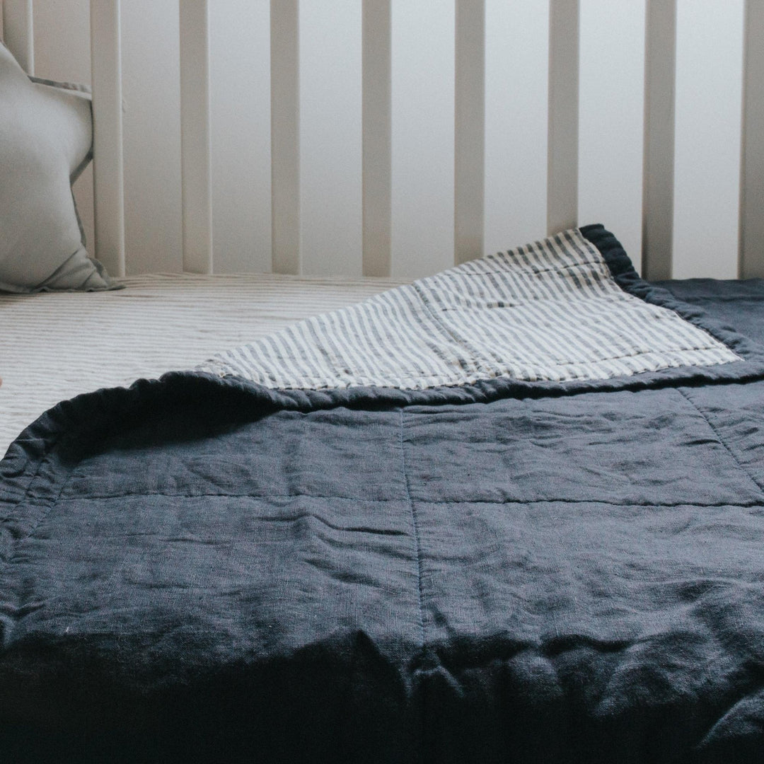 Foxtrot Home French Flax Linen styled in a bedroom with Navy & Blue Stripes Quilt.