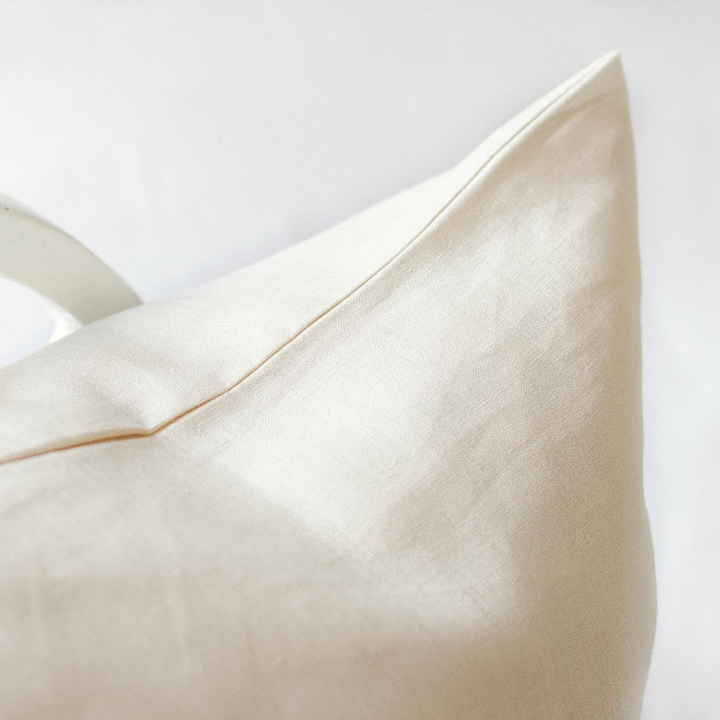 Foxtrot Home French Flax Linen styled in a bedroom with Oat Pillowcases.