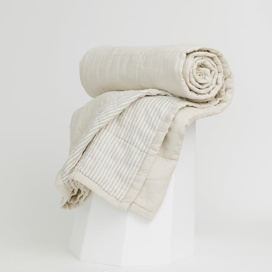 Foxtrot Home French Flax Linen Quilt in Oat with Sand Stripes on the reverse