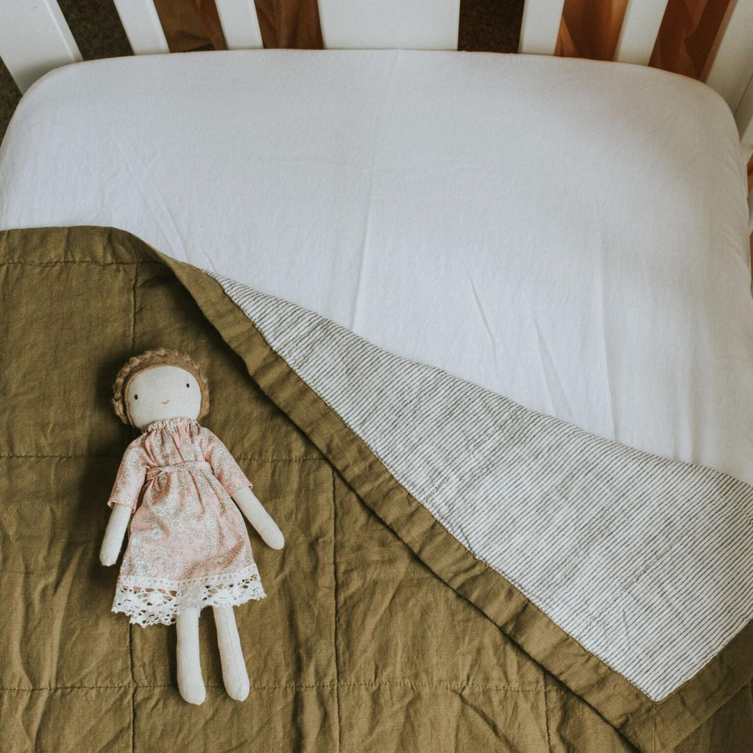 Foxtrot Home French Flax Linen styled in a bedroom with Olive Green & Pinstripes Quilt.