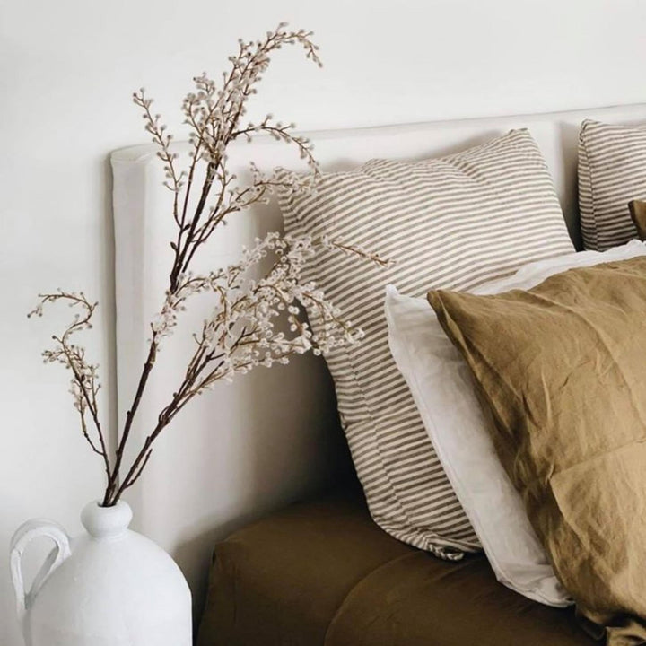 Foxtrot Home French Flax Linen styled in a bedroom with Olive Green Sheets Sets.