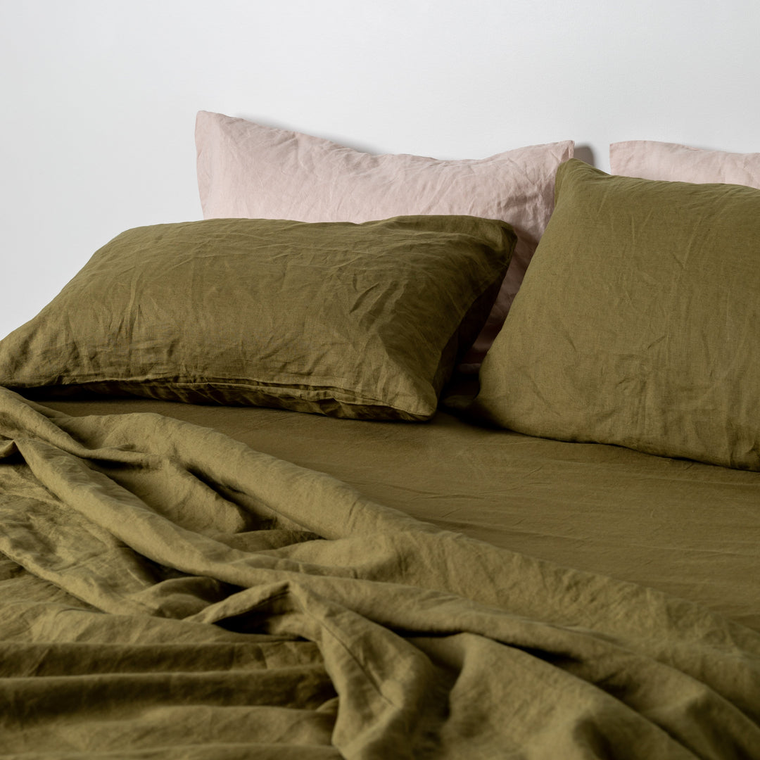 Foxtrot Home French Flax Linen styled in a bedroom with Olive Green Sheets Sets.