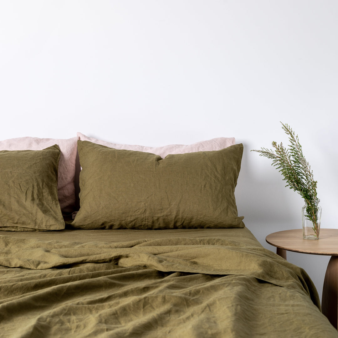 Foxtrot Home French Flax Linen styled in a bedroom with Olive Green Sheets Sets.