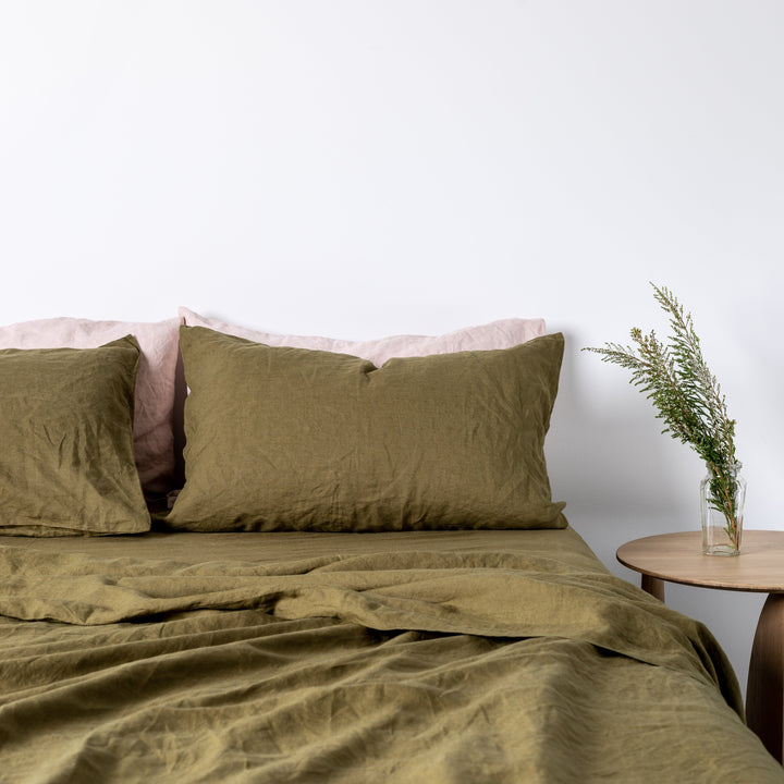 Foxtrot Home French Flax Linen styled in a bedroom with Olive Green Sheets Sets.