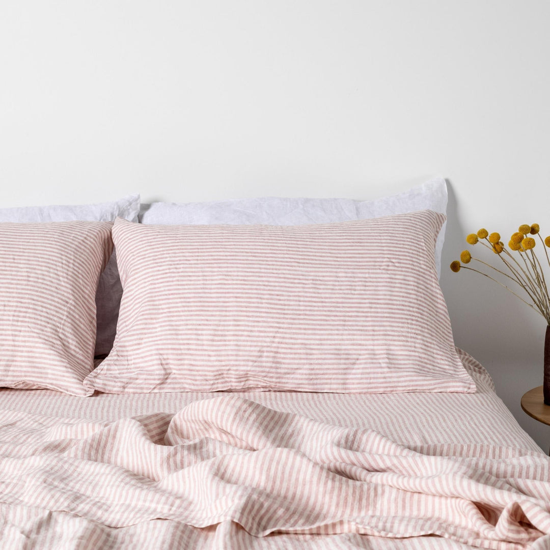 Foxtrot Home French Flax Linen styled in a bedroom with Pink Stripes Flat Sheet.