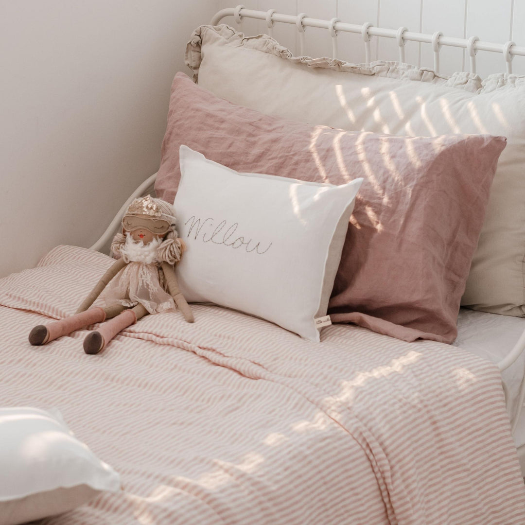 Foxtrot Home French Flax Linen styled in a bedroom with Pink Stripes Duvet.