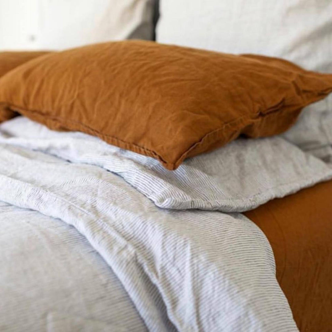 Foxtrot Home French Flax Linen styled in a bedroom with Pinstripe Fitted Sheet.