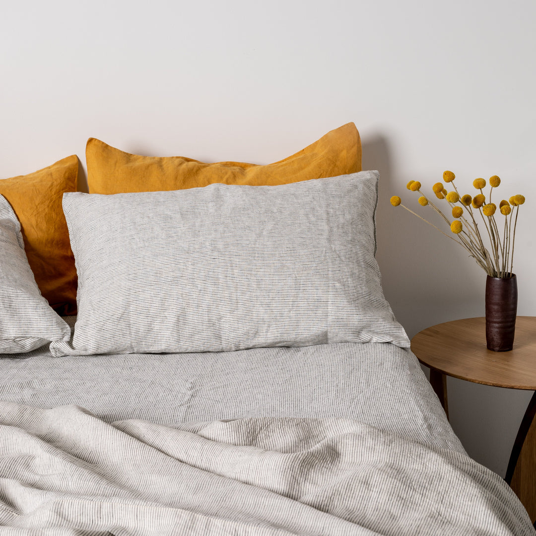 Foxtrot Home French Flax Linen styled in a bedroom with Pinstripe Fitted Sheet.